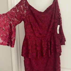 Fashion to Figure off the shoulder peplum lace dress.